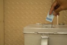 white and blue plastic container